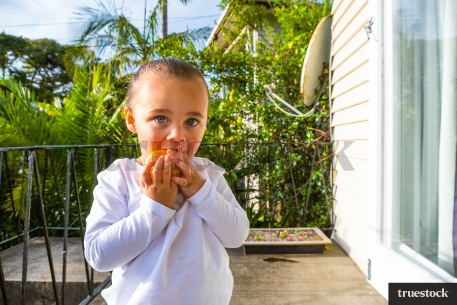 Girl Eating an Apple
