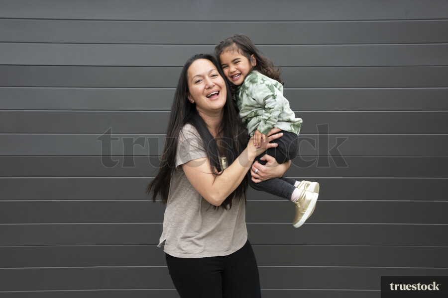 Mother Holding Daughter