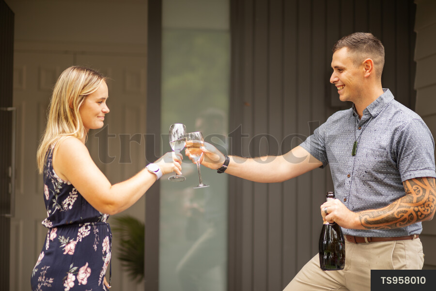Couple celebrating with champagne