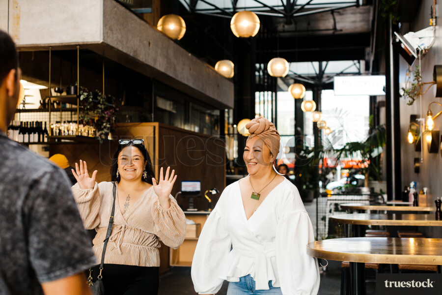 Friends Walking into Restaurant