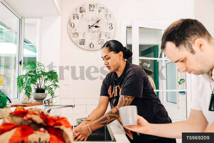 Woman Washing Dishes