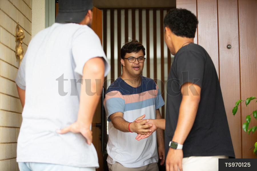 Friends leaving house