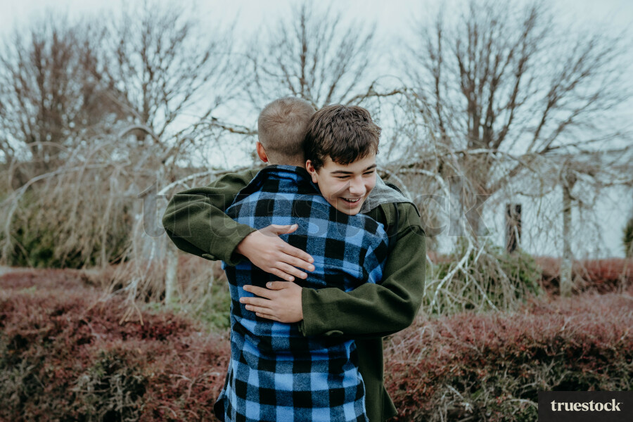 Father and son hugging