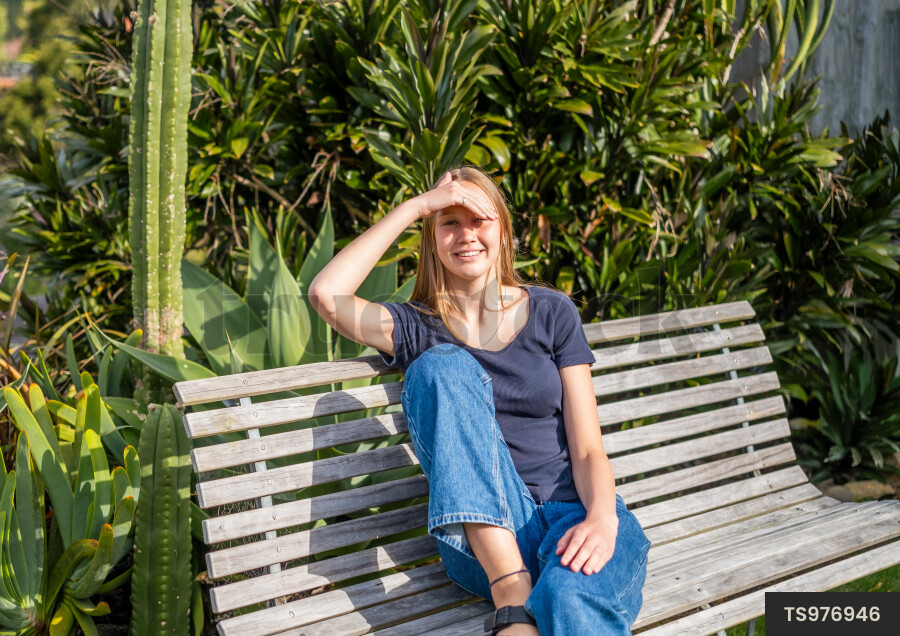 Teen Girl Sitting on Bench