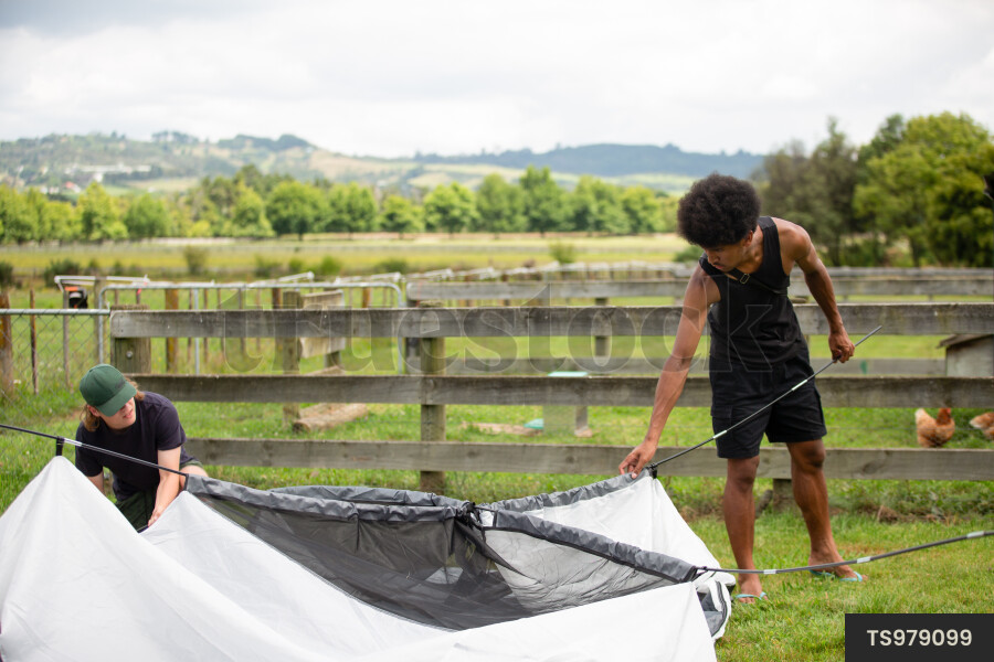 Teens Setting up Tent