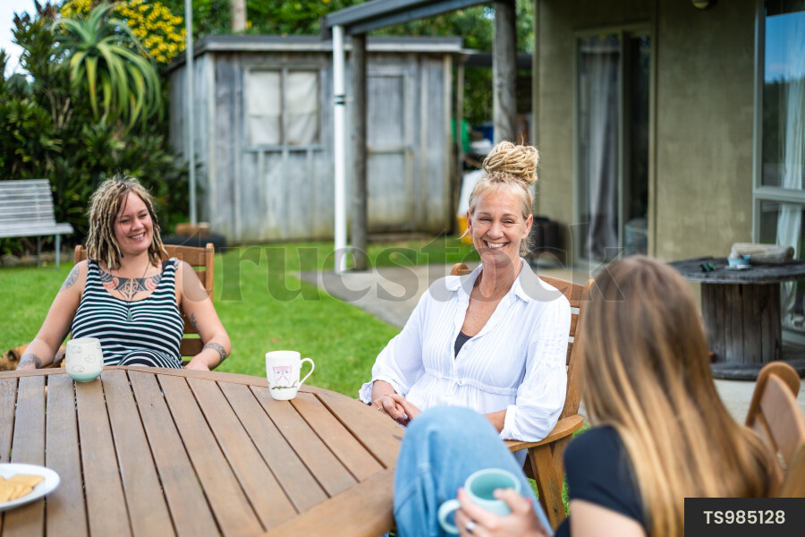 Family at Table Outside