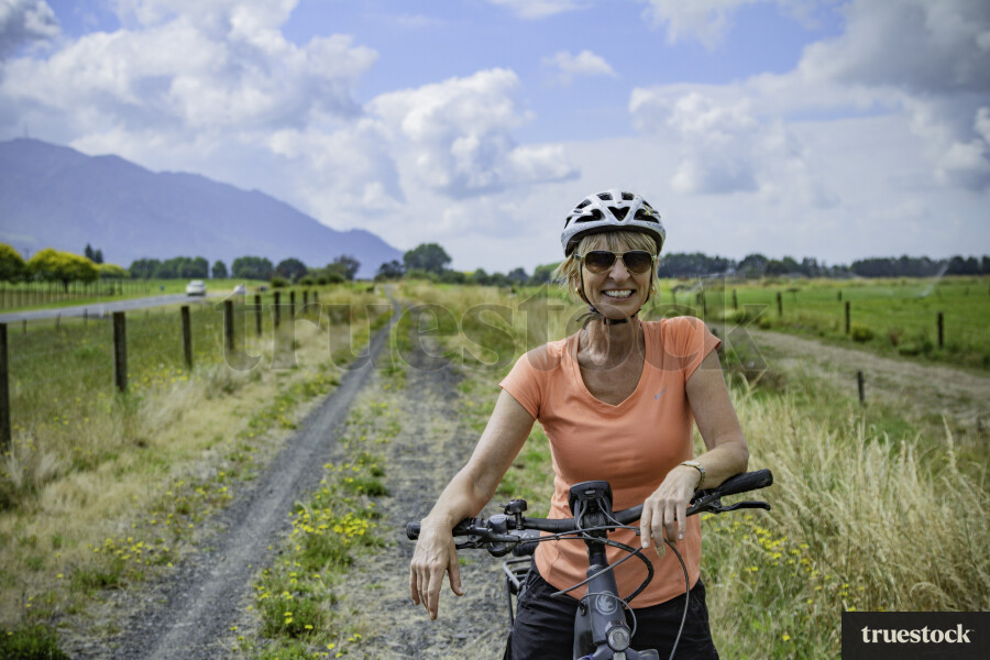 Female Cyclist in Rural Area