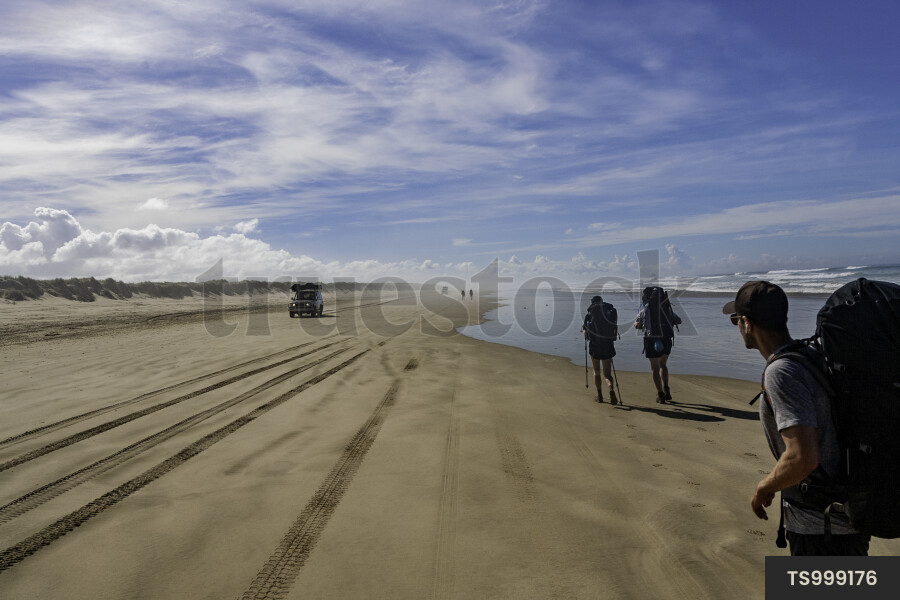 Backpackers on Beach